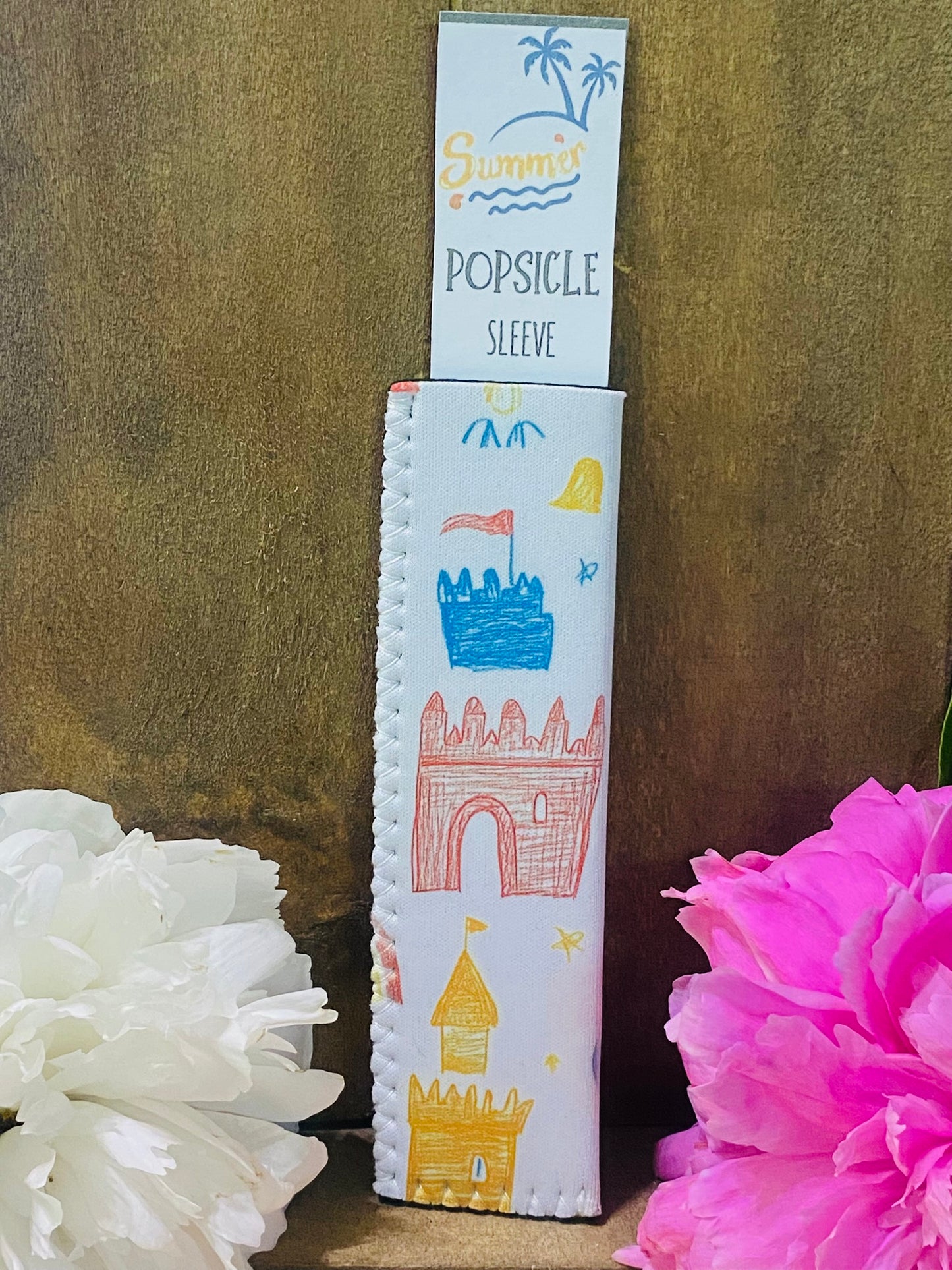 Freeze pop sleeve Child drawn sand castles
