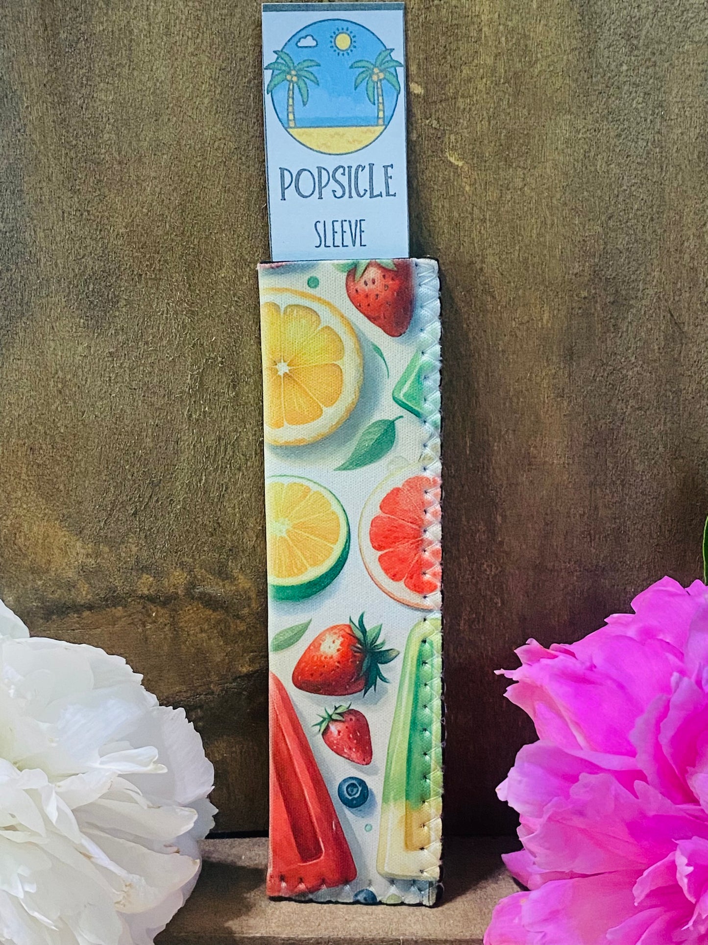 Freeze pop sleeve fruit and popsicle on yellow