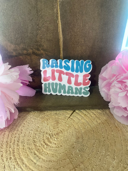 Raising little humans Sticker