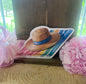 Beach blanket and sun hat sticker