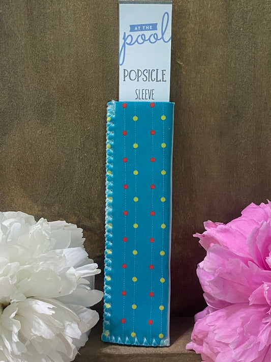 Freeze pop sleeve Teal blue, red and yellows dots